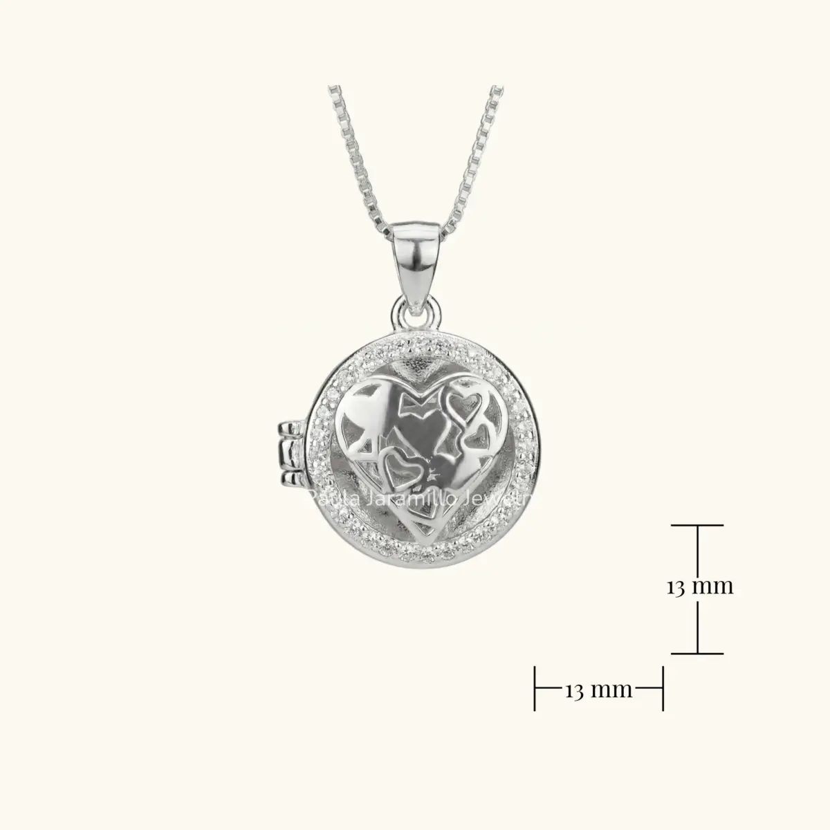 RELICARIO LATIDO EN PLATA